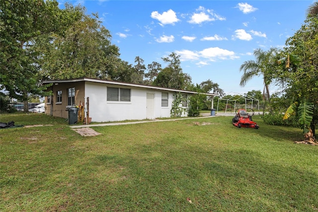 view of yard featuring a carport