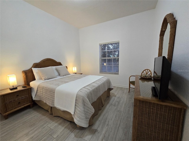 bedroom featuring light hardwood / wood-style flooring