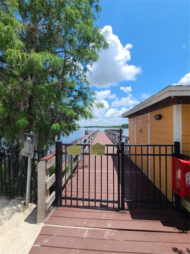 view of gate featuring a water view