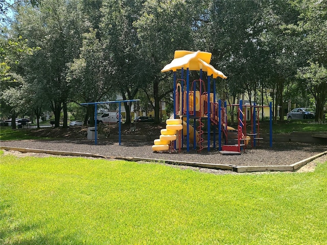 view of play area with a yard