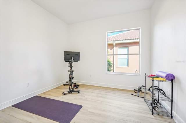 exercise area featuring light wood-type flooring