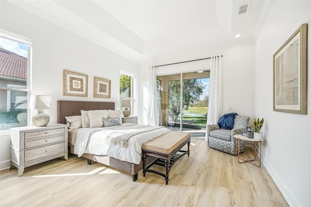 bedroom with access to outside, ornamental molding, and light wood-type flooring