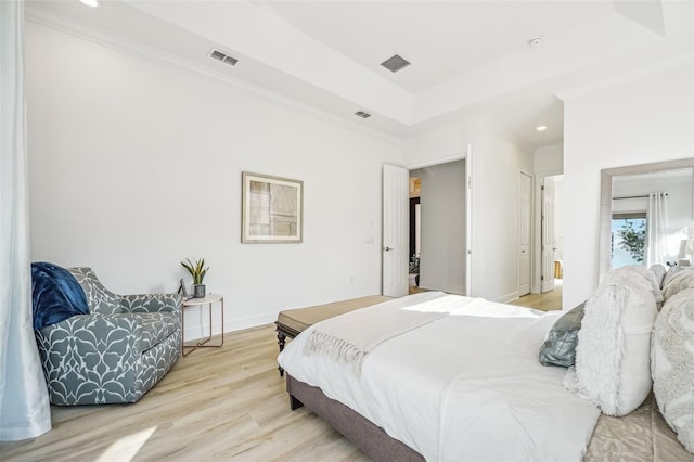 bedroom with hardwood / wood-style flooring