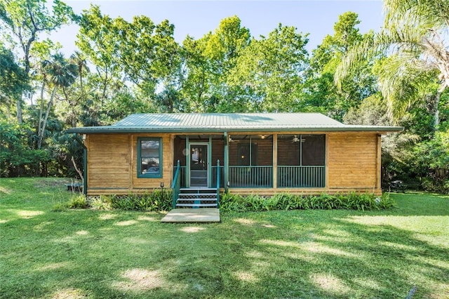 ranch-style house featuring a front yard