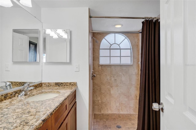 bathroom with vanity and a shower with curtain