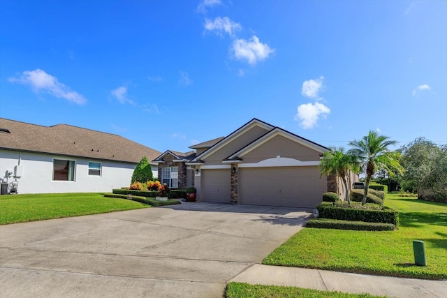 ranch-style home featuring a garage and a front lawn