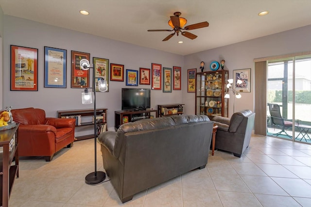 tiled living room with ceiling fan