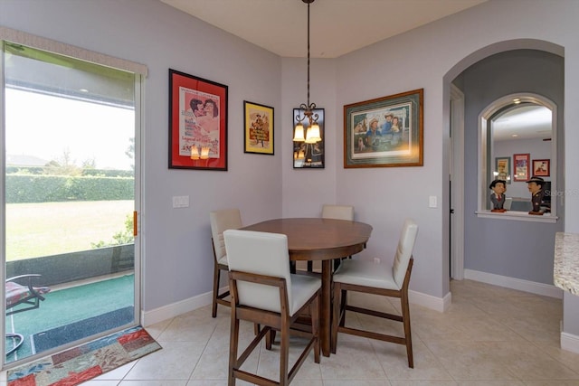 dining space with light tile patterned floors