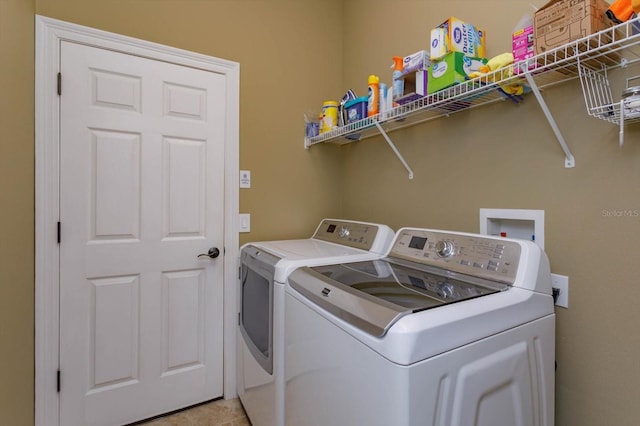 laundry area featuring independent washer and dryer