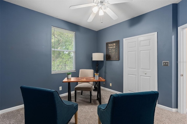 home office featuring carpet flooring and ceiling fan