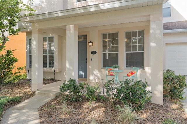 property entrance featuring a porch