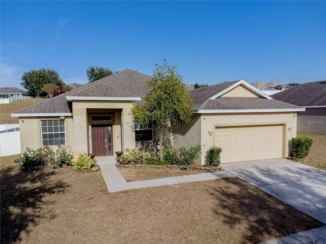 ranch-style house featuring a garage