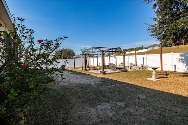 view of yard with a pergola