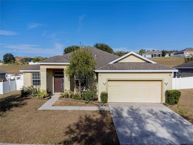 single story home with a garage