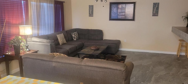 115 Canna Dr, Davenport, FL 33897 - living room featuring baseboards