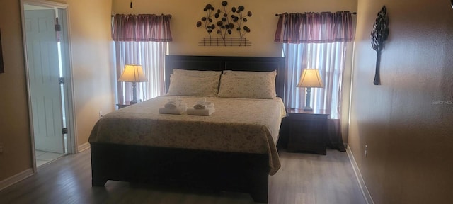 115 Canna Dr, Davenport, FL 33897 - bedroom featuring wood finished floors