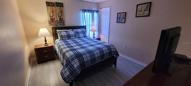 bedroom featuring hardwood / wood-style floors