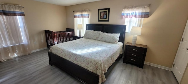 bedroom featuring hardwood / wood-style floors