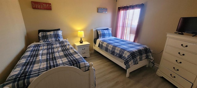 bedroom featuring light hardwood / wood-style floors