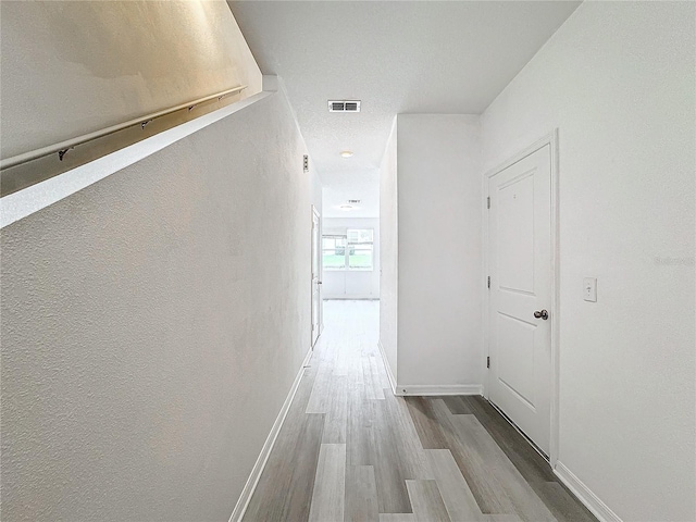 hall featuring hardwood / wood-style floors