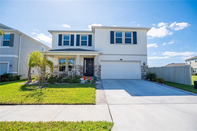 view of front of property with a front yard, fence, stucco siding, concrete driveway, and stone siding