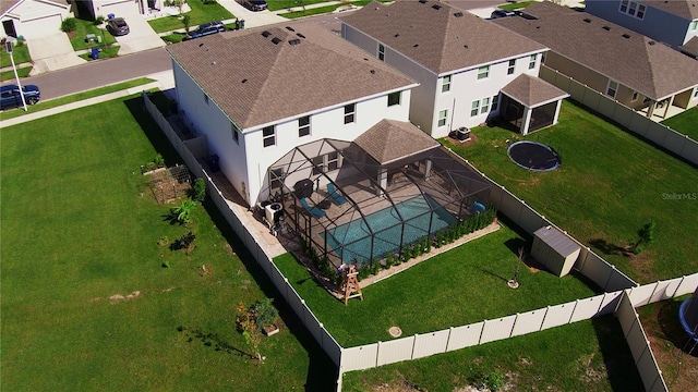 birds eye view of property with a residential view