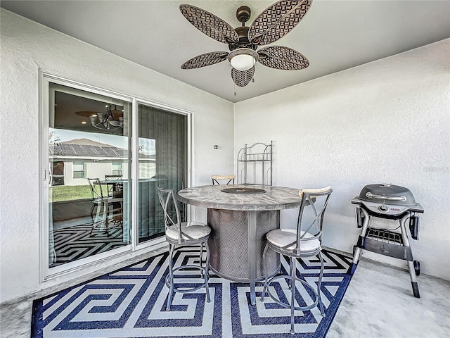 view of patio with ceiling fan