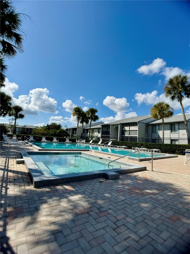 view of swimming pool featuring a patio