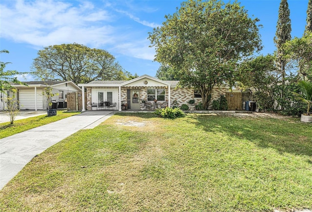 single story home with a front lawn