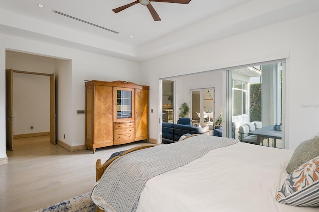 bedroom featuring light hardwood / wood-style flooring and ceiling fan