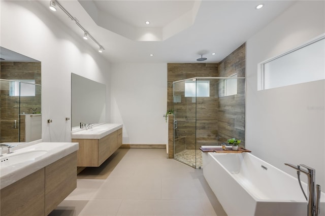 bathroom with vanity, tile patterned floors, and separate shower and tub