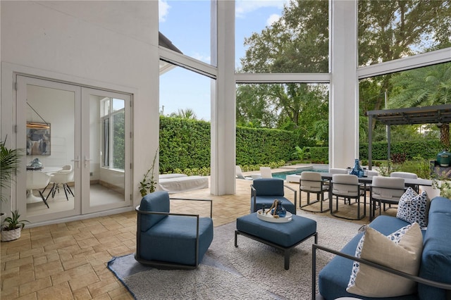 sunroom featuring a healthy amount of sunlight