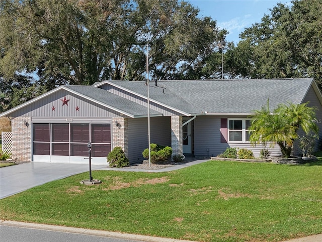 ranch-style house featuring a front yard and a garage