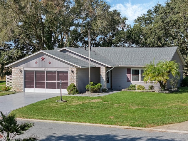 ranch-style home featuring a front yard and a garage