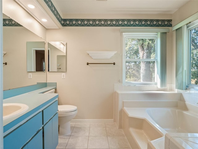 bathroom featuring vanity, toilet, a bath, and tile patterned floors