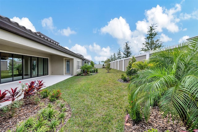 view of yard with a patio area