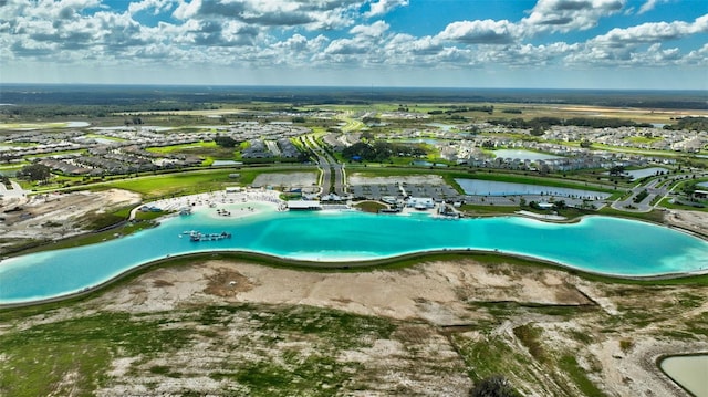 view of pool with a water view