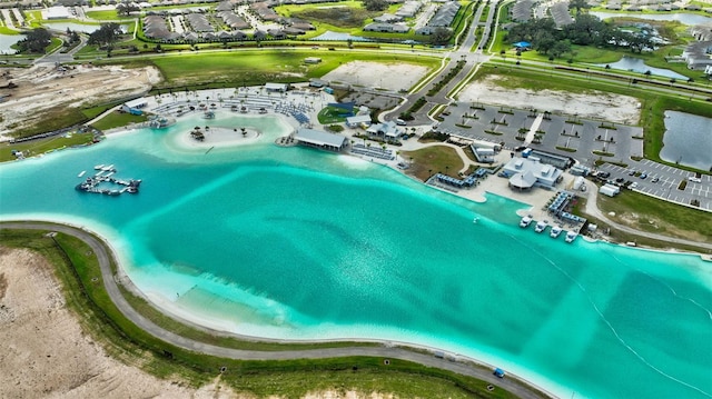 aerial view with a beach view and a water view