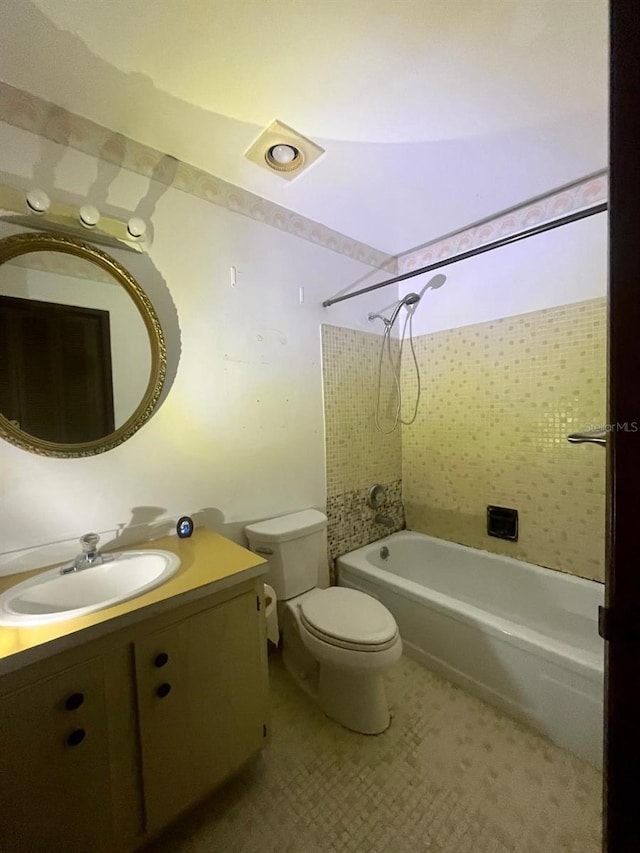 full bathroom featuring toilet, shower / tub combination, and vanity