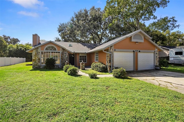 ranch-style house with a front yard and a garage