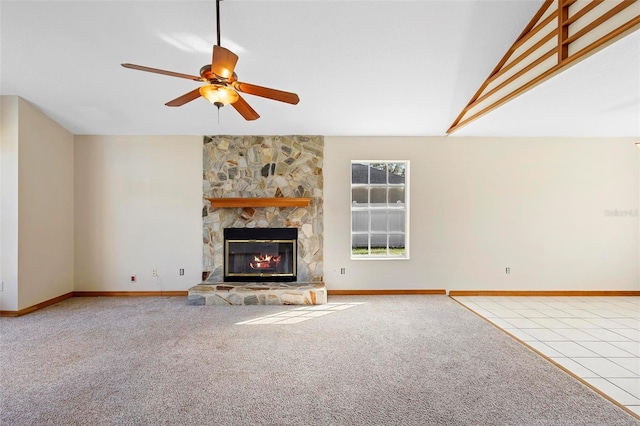 unfurnished living room with light colored carpet, a fireplace, and ceiling fan