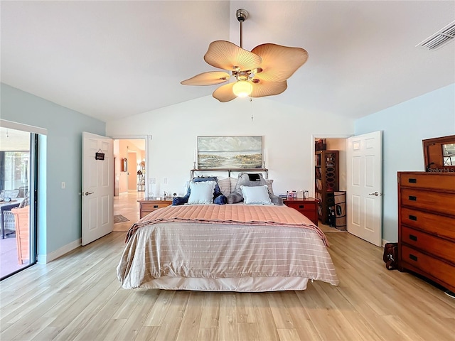 bedroom featuring light hardwood / wood-style floors, ceiling fan, vaulted ceiling, and access to outside