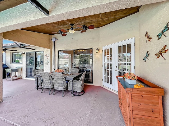 view of patio / terrace with french doors and ceiling fan