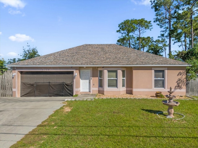 single story home featuring a front yard and a garage