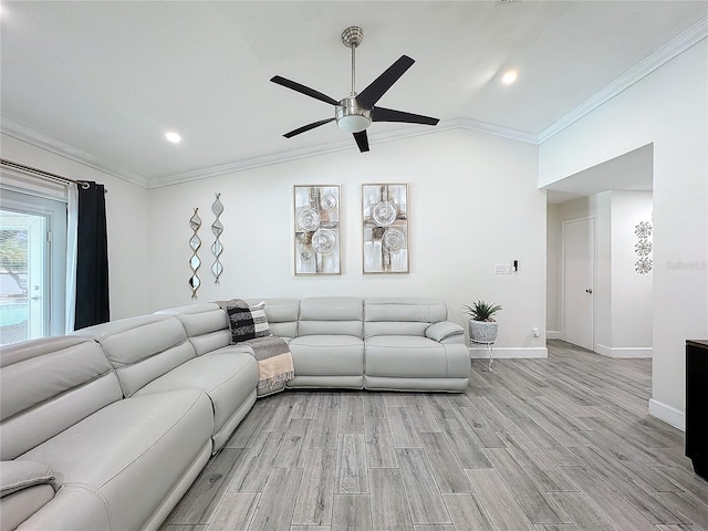 living room featuring light hardwood / wood-style flooring, ornamental molding, lofted ceiling, and ceiling fan