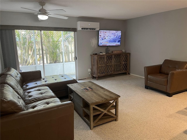 living room featuring a wall mounted air conditioner and ceiling fan