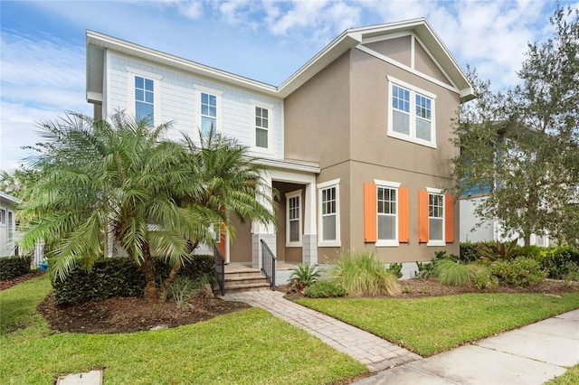 view of front of property featuring a front lawn