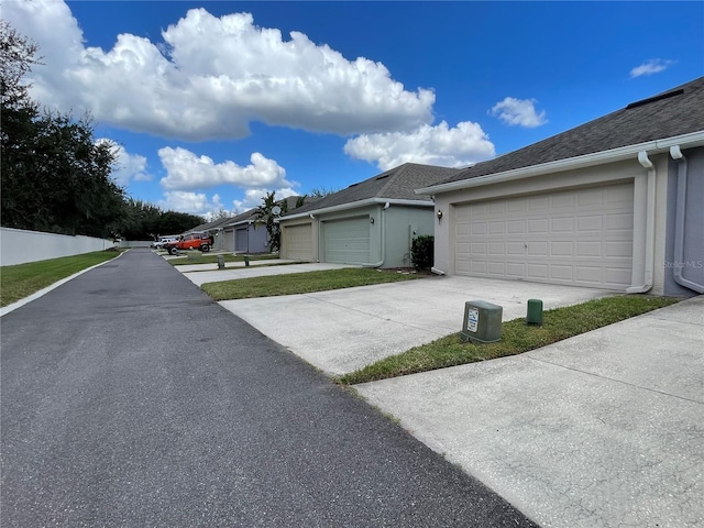 exterior space featuring a garage