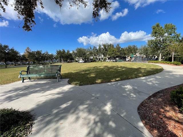 view of home's community featuring a yard