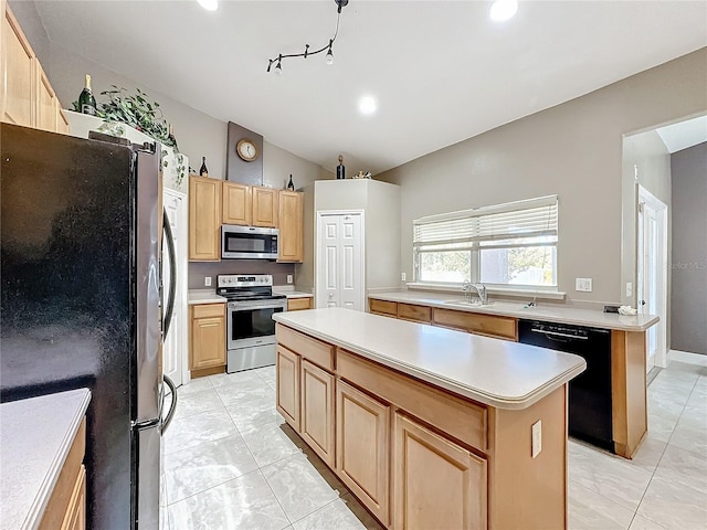 kitchen with light tile patterned flooring, a center island, stainless steel appliances, and sink